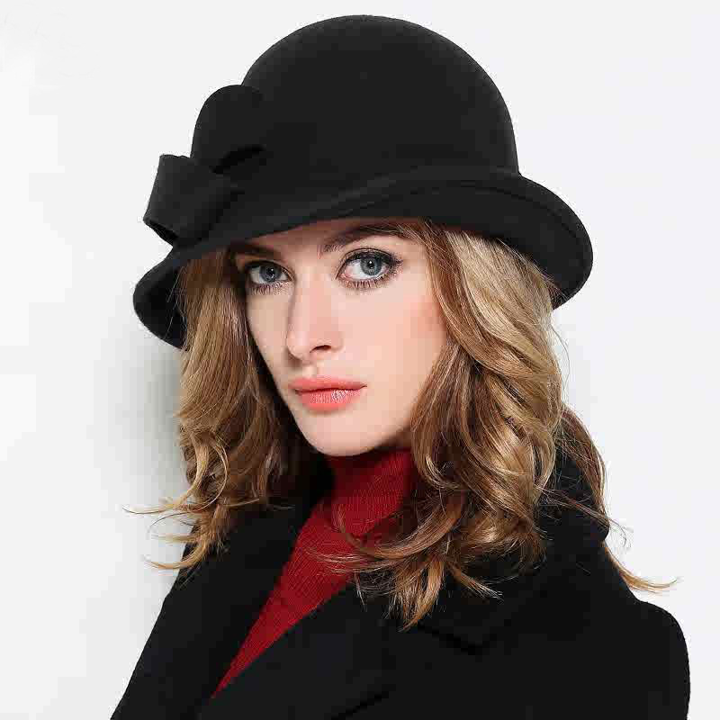 Chapeau cloche vintage pour femme avec nœud sur le côté