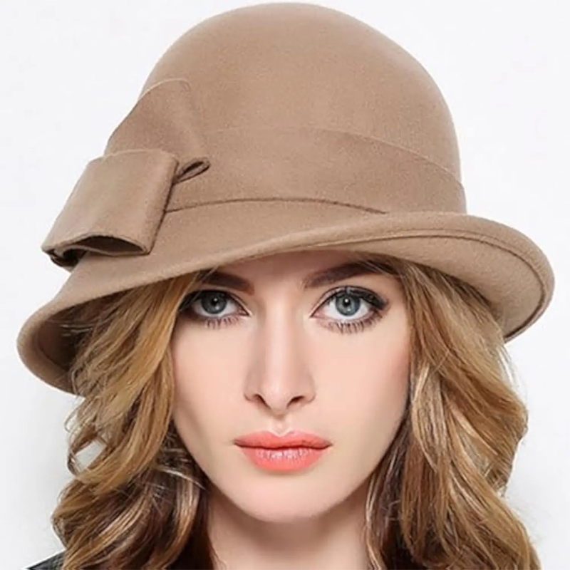 Chapeau cloche vintage pour femme avec nœud sur le côté